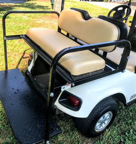 The cargo area also includes a 360 degree bed rail that will secure cargo. . Back seat for club car golf cart